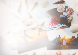 printed photos capturing moments, decorated by some sea shells